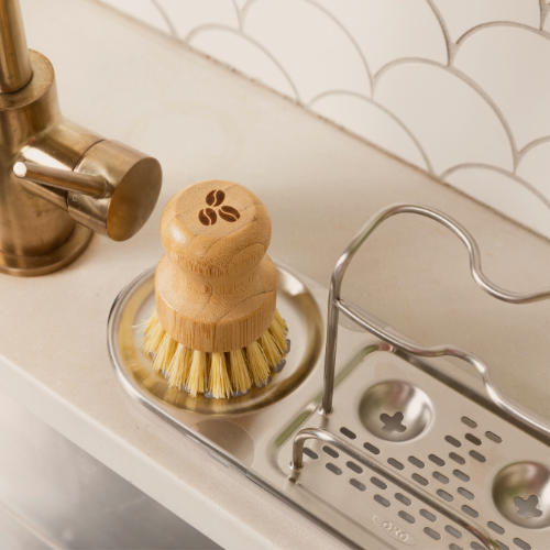 Designed to use in cleaning the strainers, this scrubber, made from bamboo, features stiff bristles and our three bean logo. The Grounds Keeper scrubber.